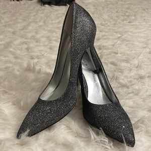 Never before worn nine W. glitter heels